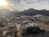 A panoramic view of the Al-Mazar Al-Shamali landscape at sunset