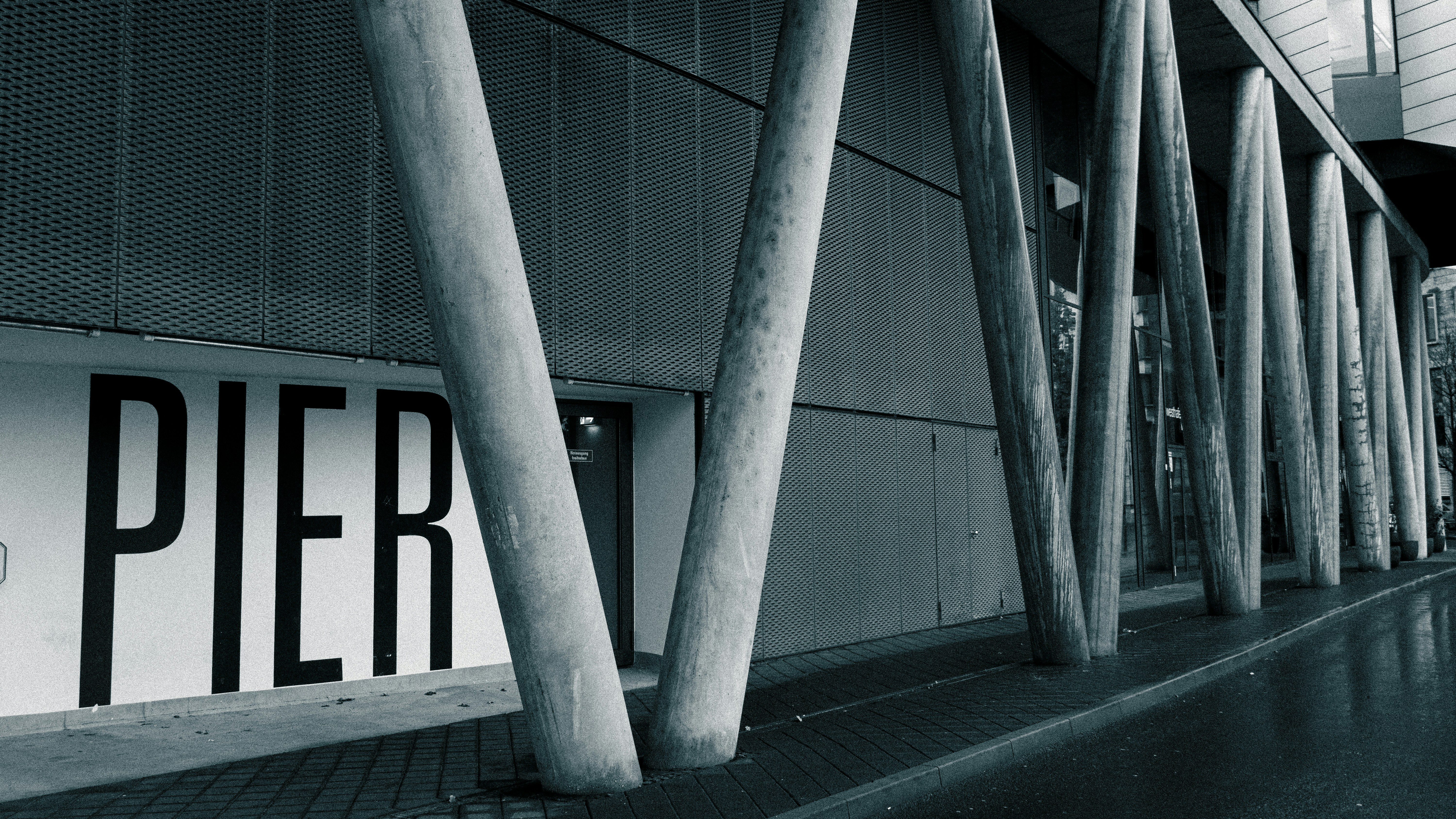 a black and white photo of a large building