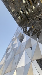 a close up of a building with a sky background