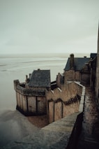 A detailed view of a fortified base built by players amidst a desolate landscape.