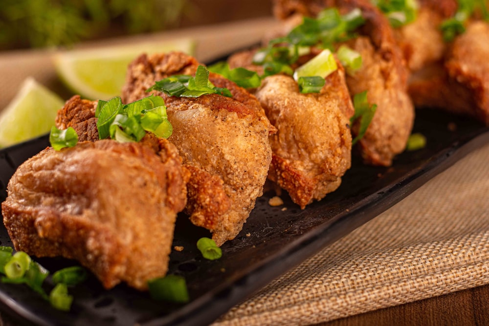 a close up of a plate of food with meat