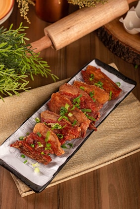 a plate of food sitting on top of a table