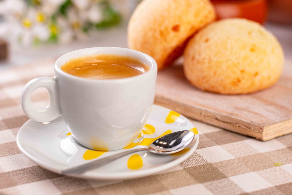 a cup of coffee sitting on top of a saucer