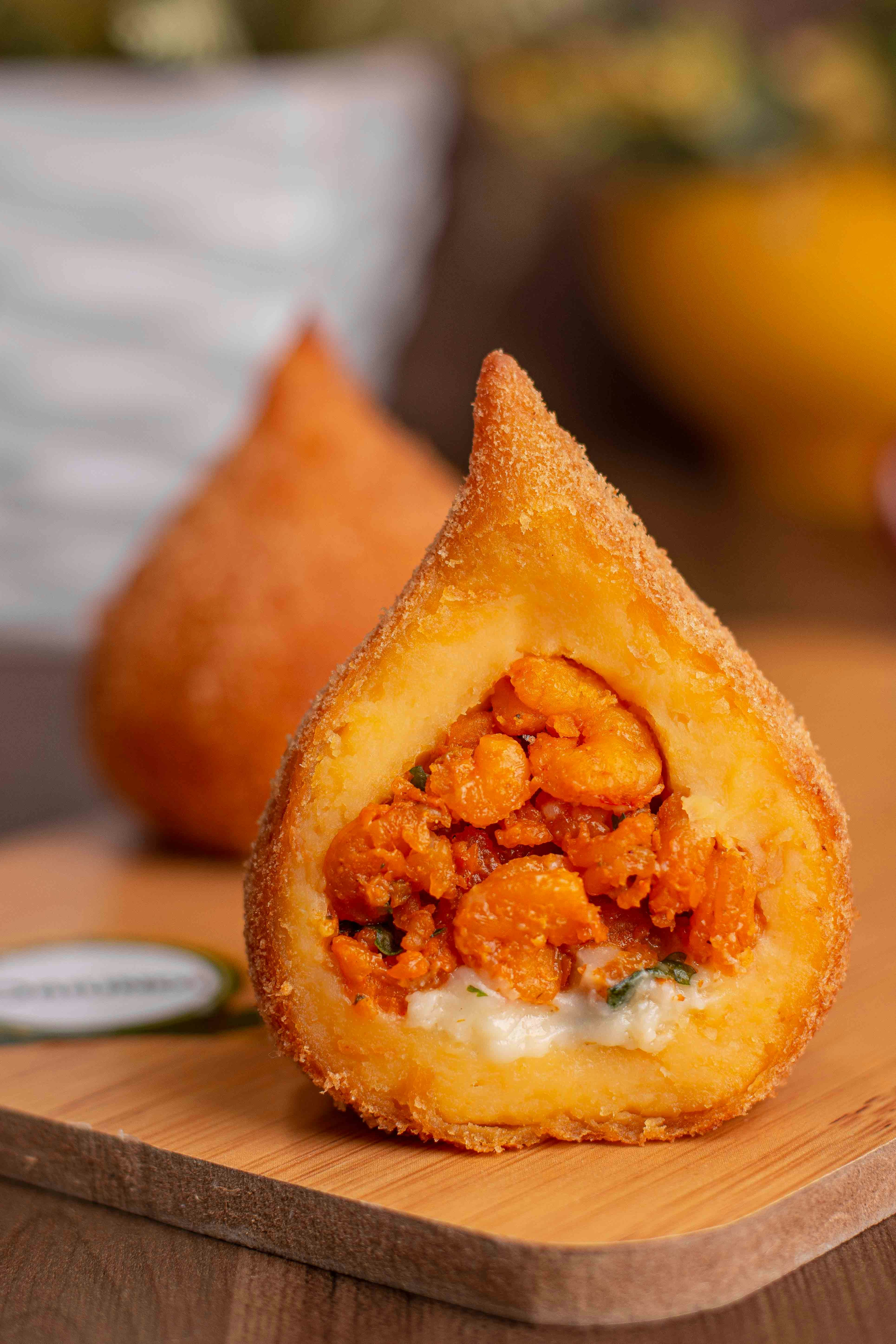 a wooden cutting board topped with a pastry