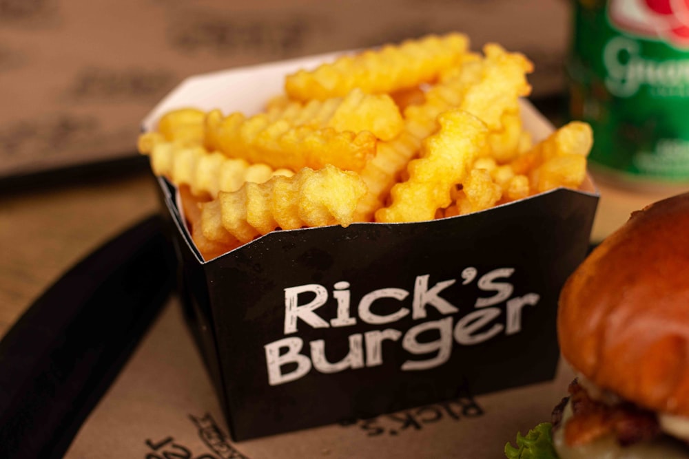 a tray with a burger and fries on it