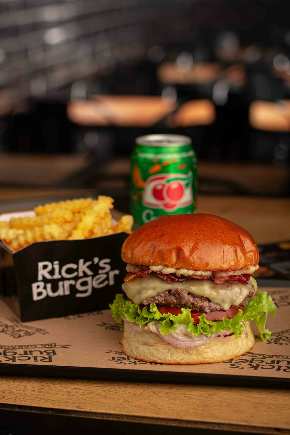 a hamburger and french fries on a tray