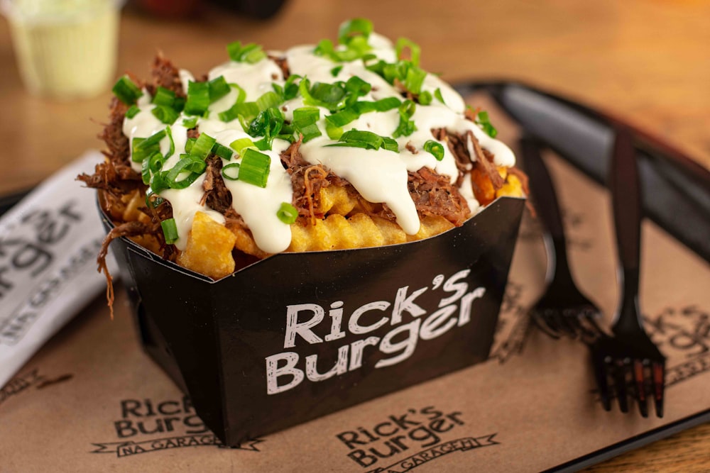 a close up of a basket of food on a tray