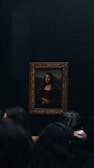 A classic oil painting replica of the Mona Lisa with soft lighting.