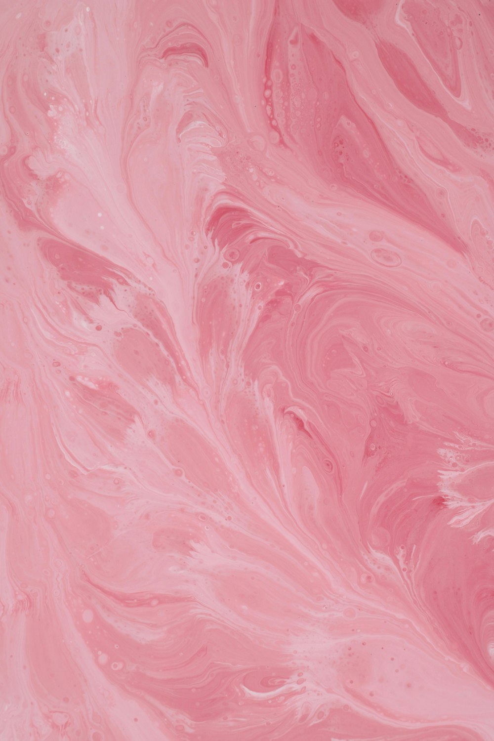 a close up of a pink paint texture