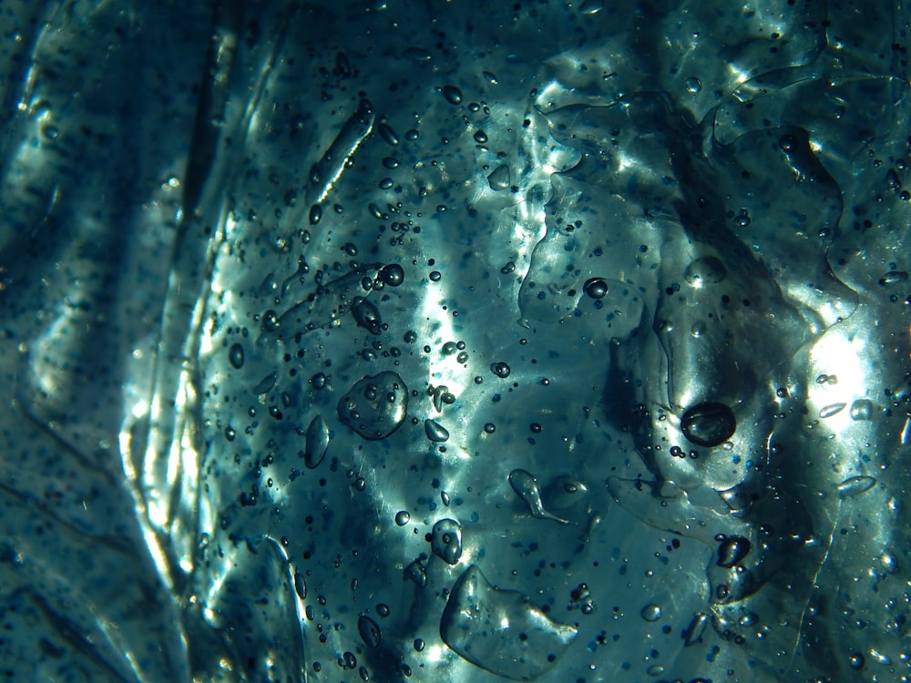 a close up view of water droplets on a surface