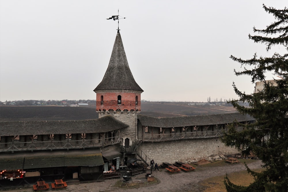 a tall tower with a clock on top of it