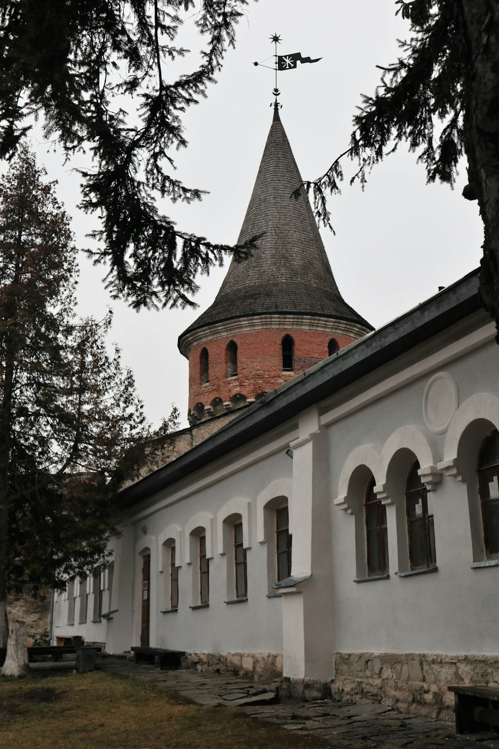 an old building with a tower on top of it