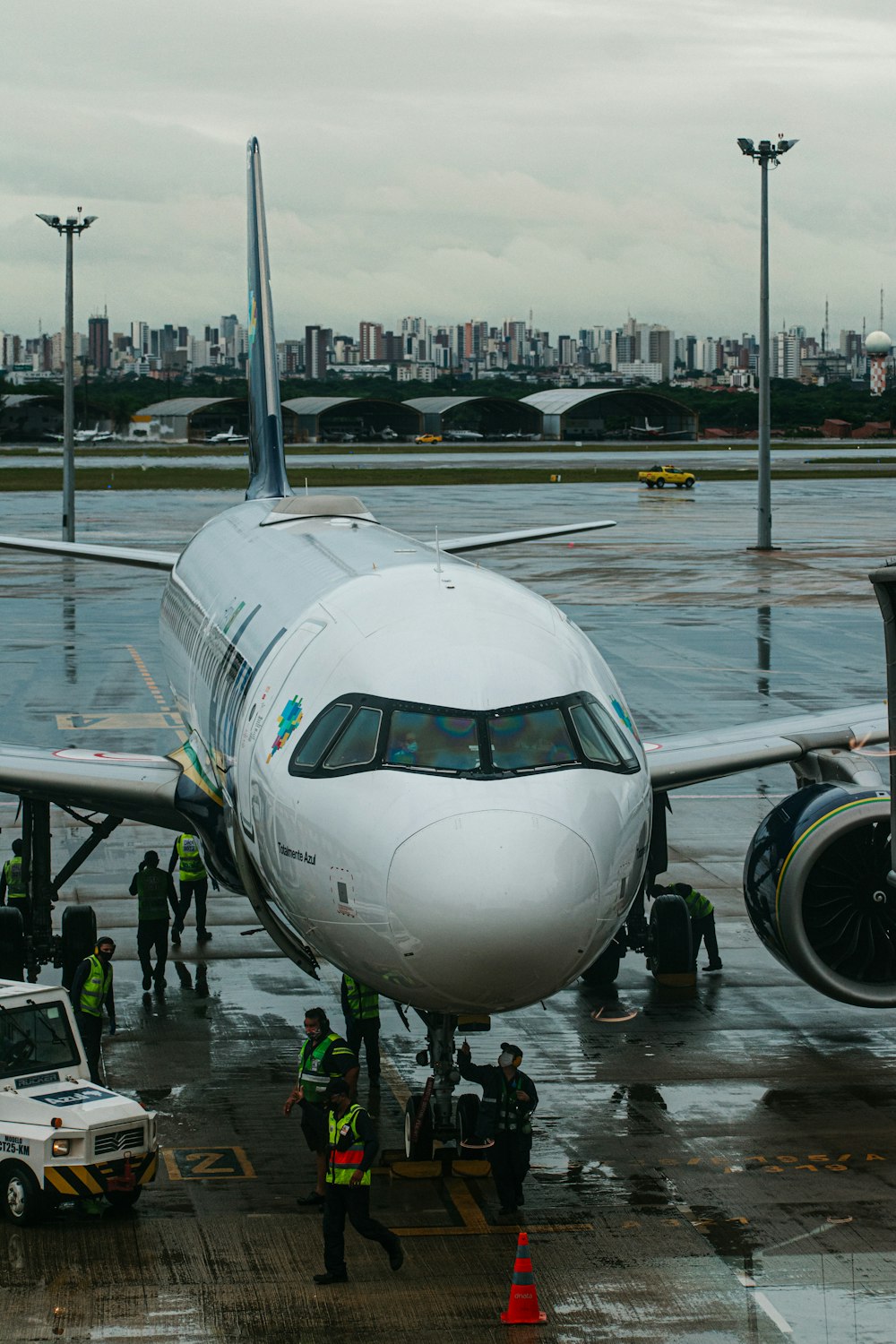 a large jetliner sitting on top of an airport tarmac