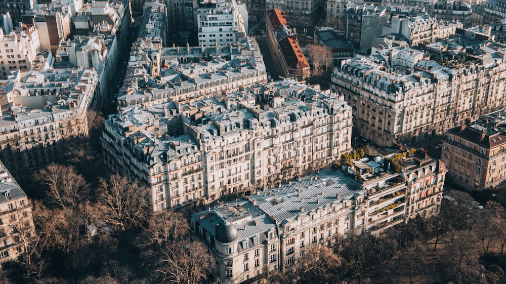 an aerial view of a city with lots of tall buildings