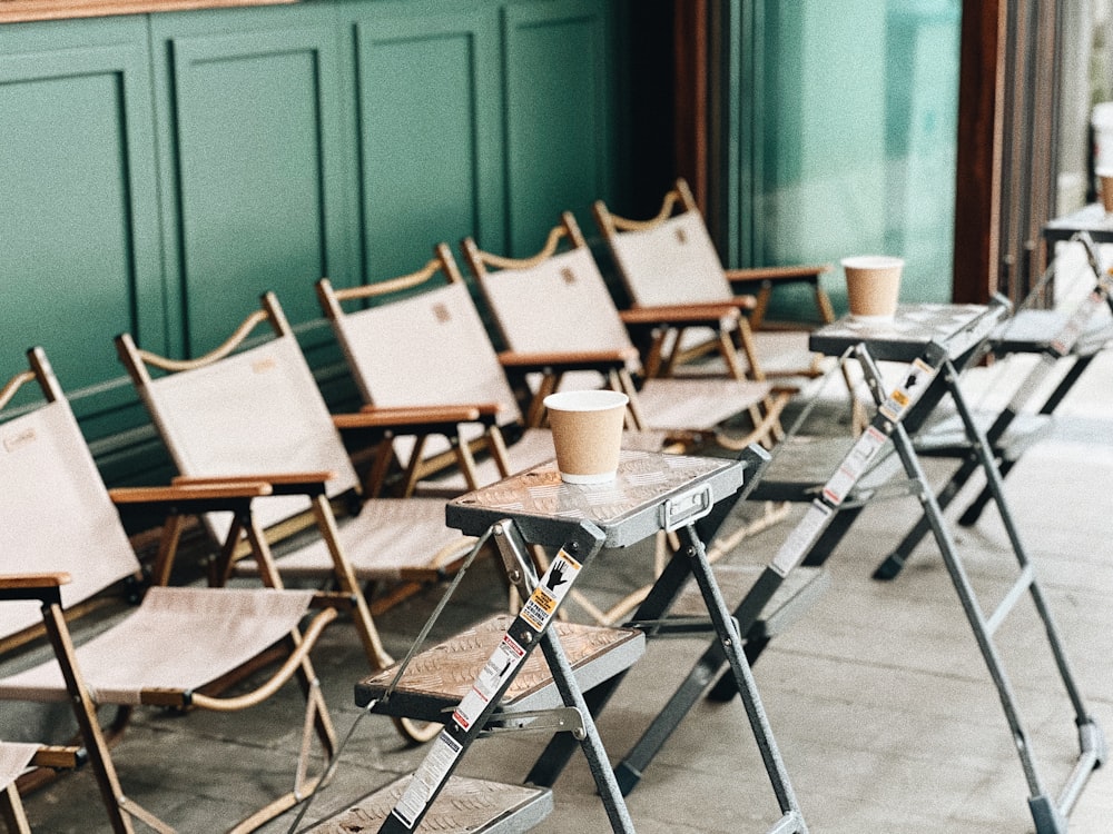 a row of empty chairs sitting next to each other