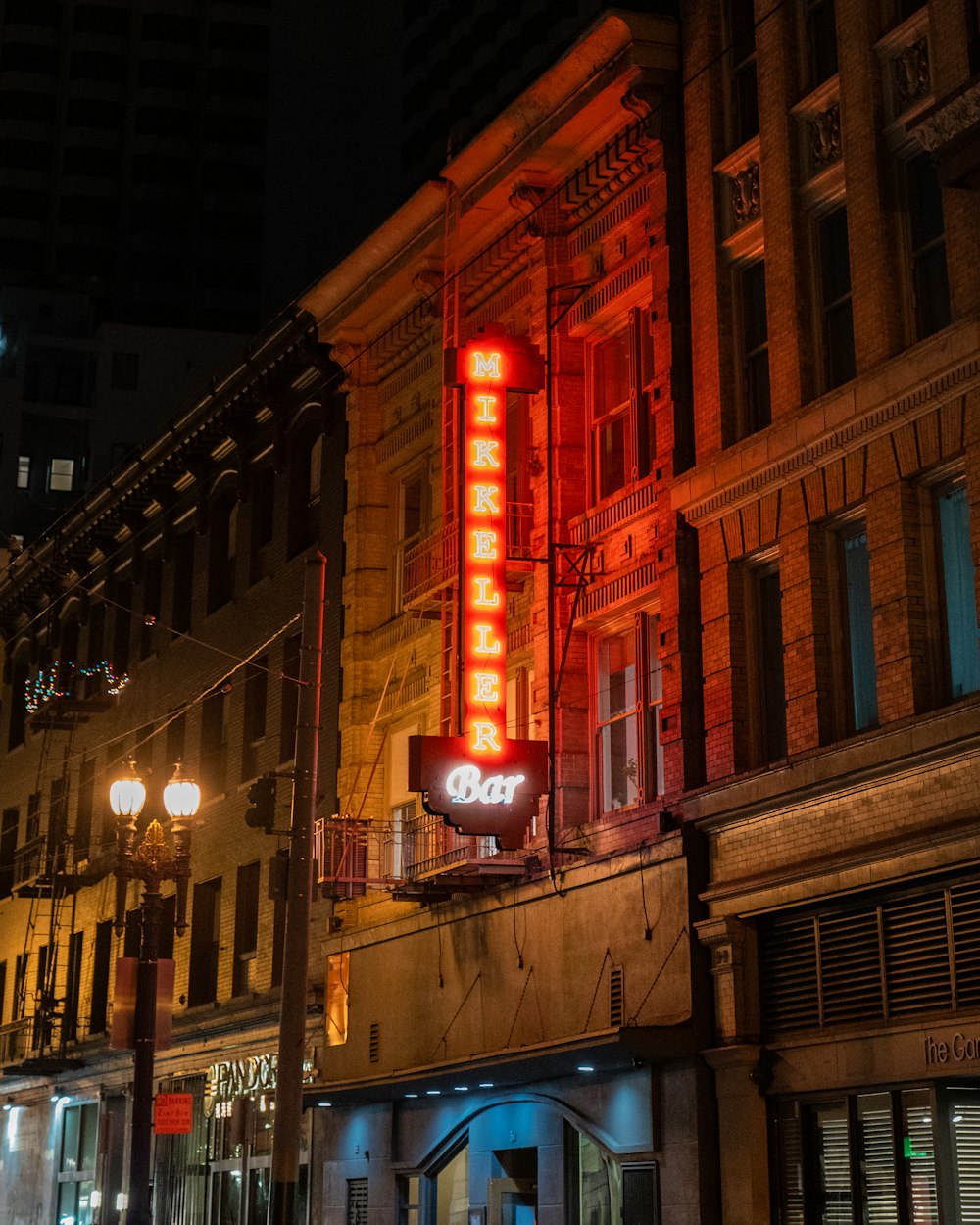 a neon sign on the side of a building