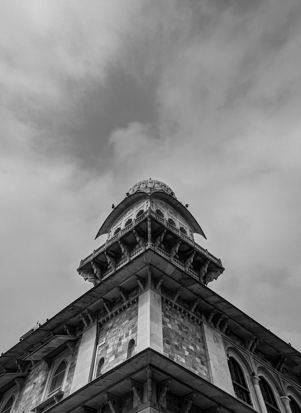 a black and white photo of a tall building