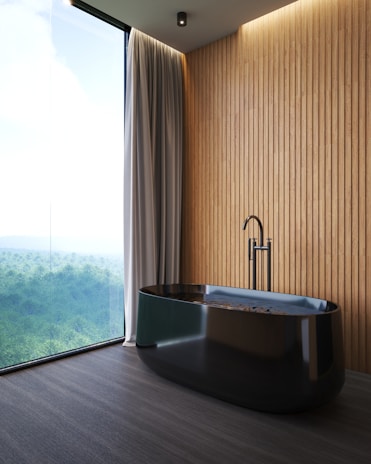 a large bath tub sitting next to a window
