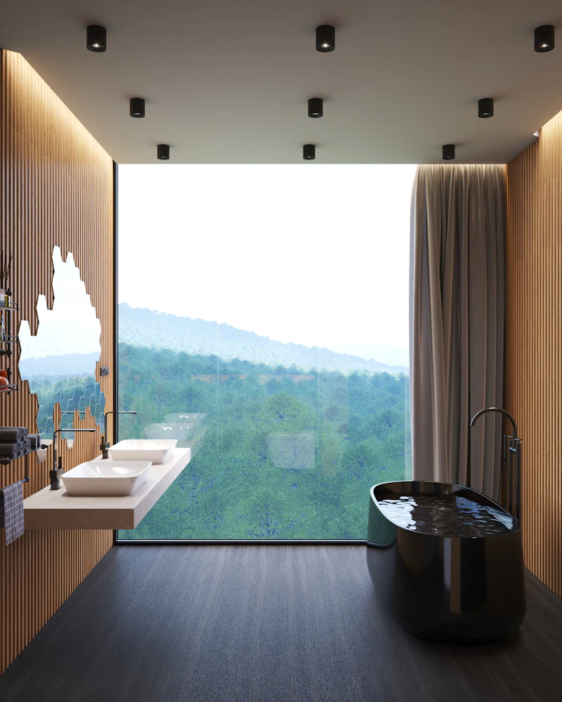 Bath beside a picture window onto hills