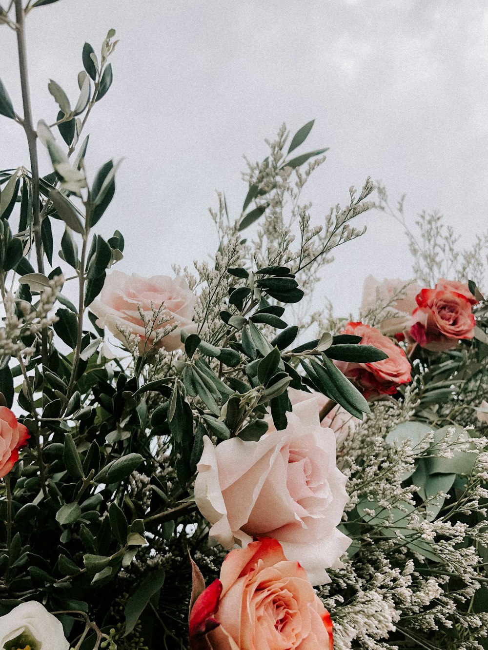 a bunch of flowers that are in a vase