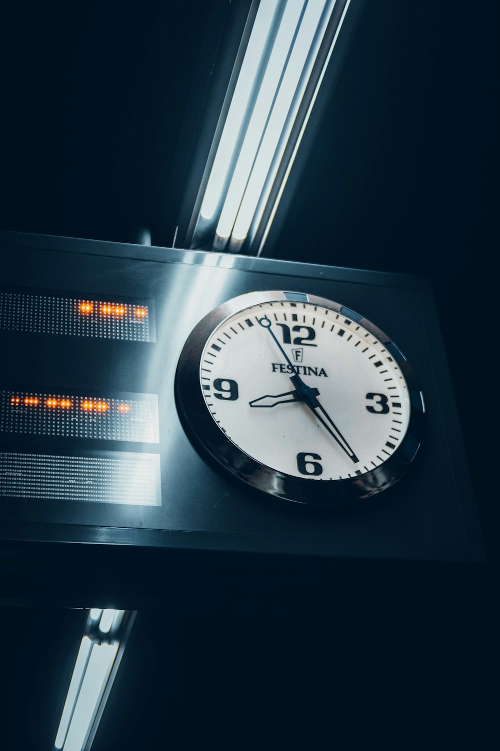 a clock that is on the side of a building