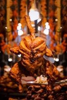 a close up of a chicken on a plate
