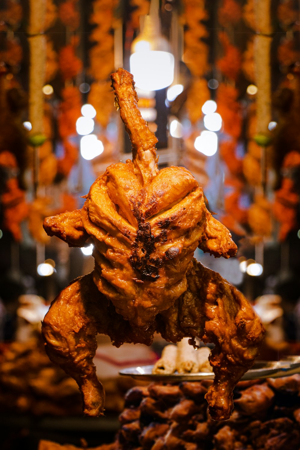 a close up of a chicken on a plate