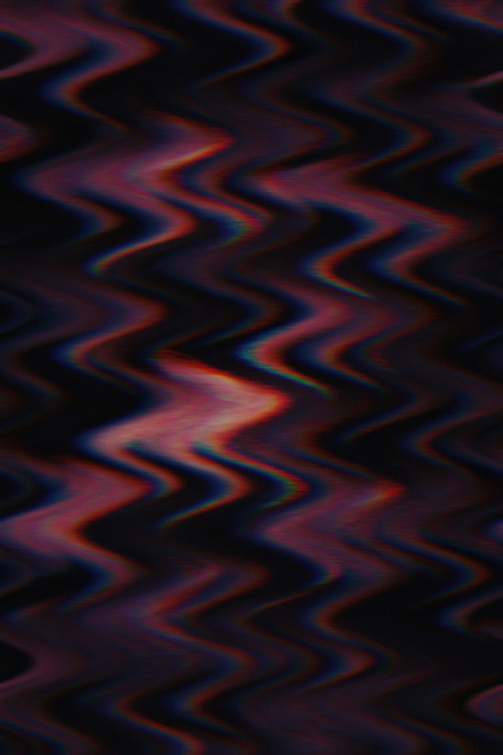 a blurry image of a black and red background