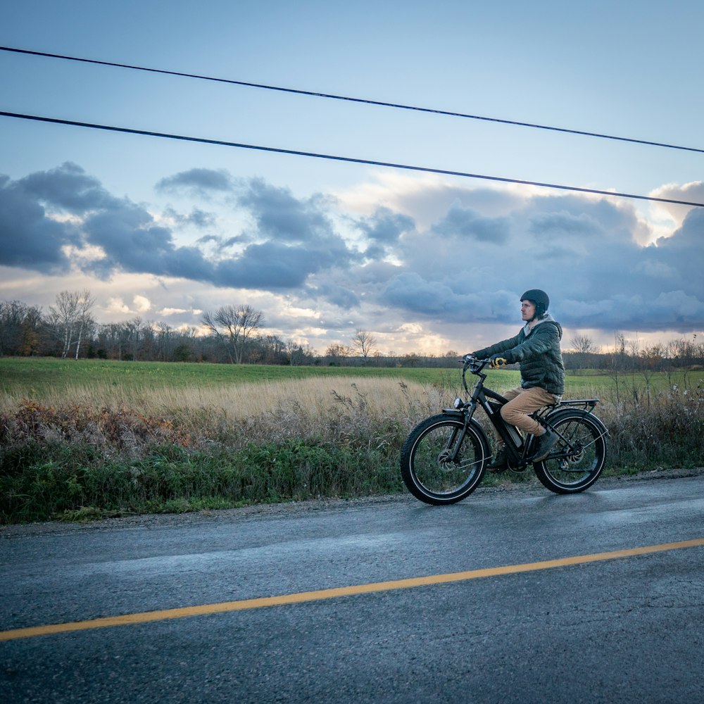 a bicycle parked on the side of a road