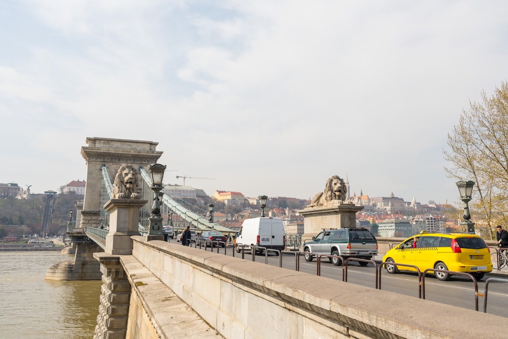 a bridge with cars and people on it