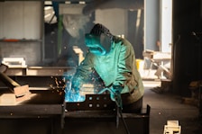 a welder working on a piece of metal