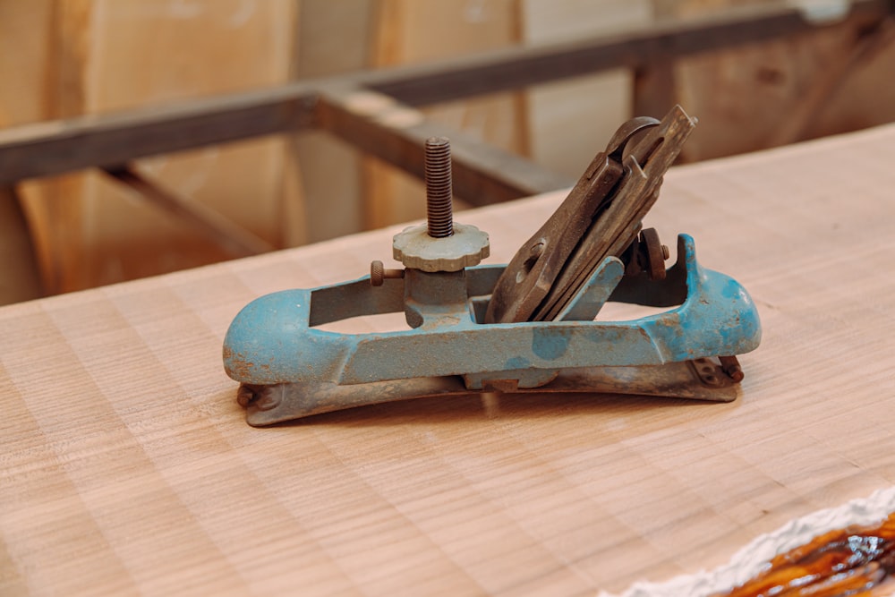 a piece of wood with a vice on top of it