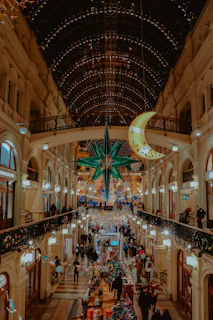 A family shopping together, carrying bags from noorbachpan, surrounded by festive banners and vibrant colors.