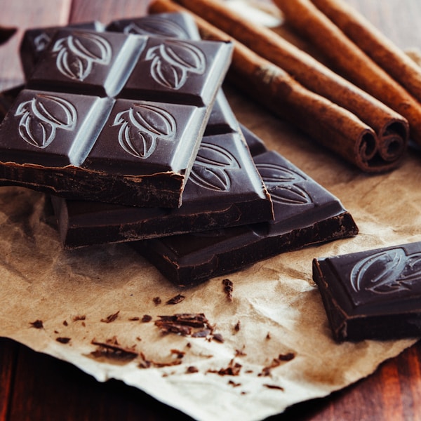 a pile of chocolate sitting on top of a piece of paper