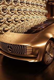 a mercedes concept car on display in a showroom