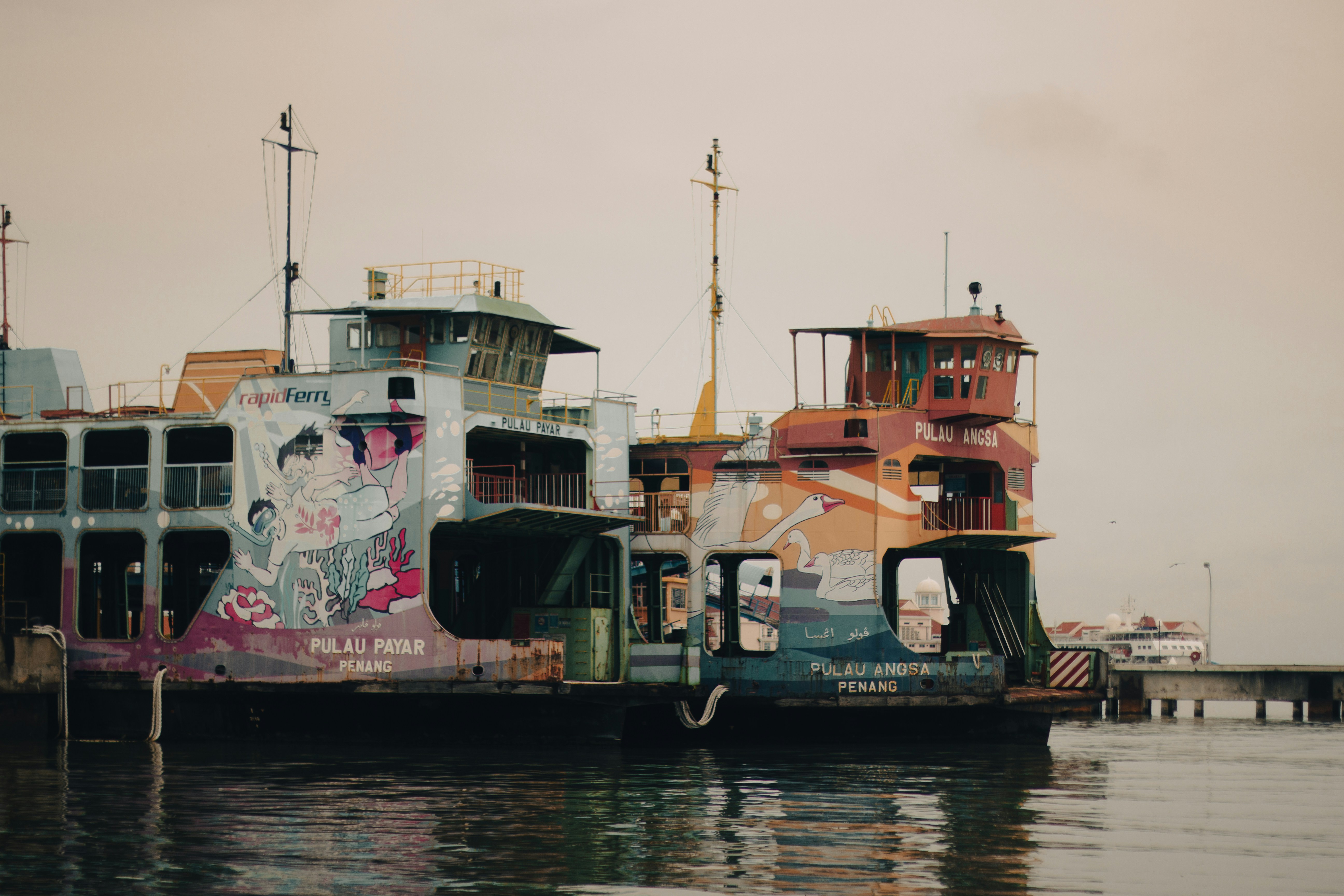 a large boat sitting on top of a body of water