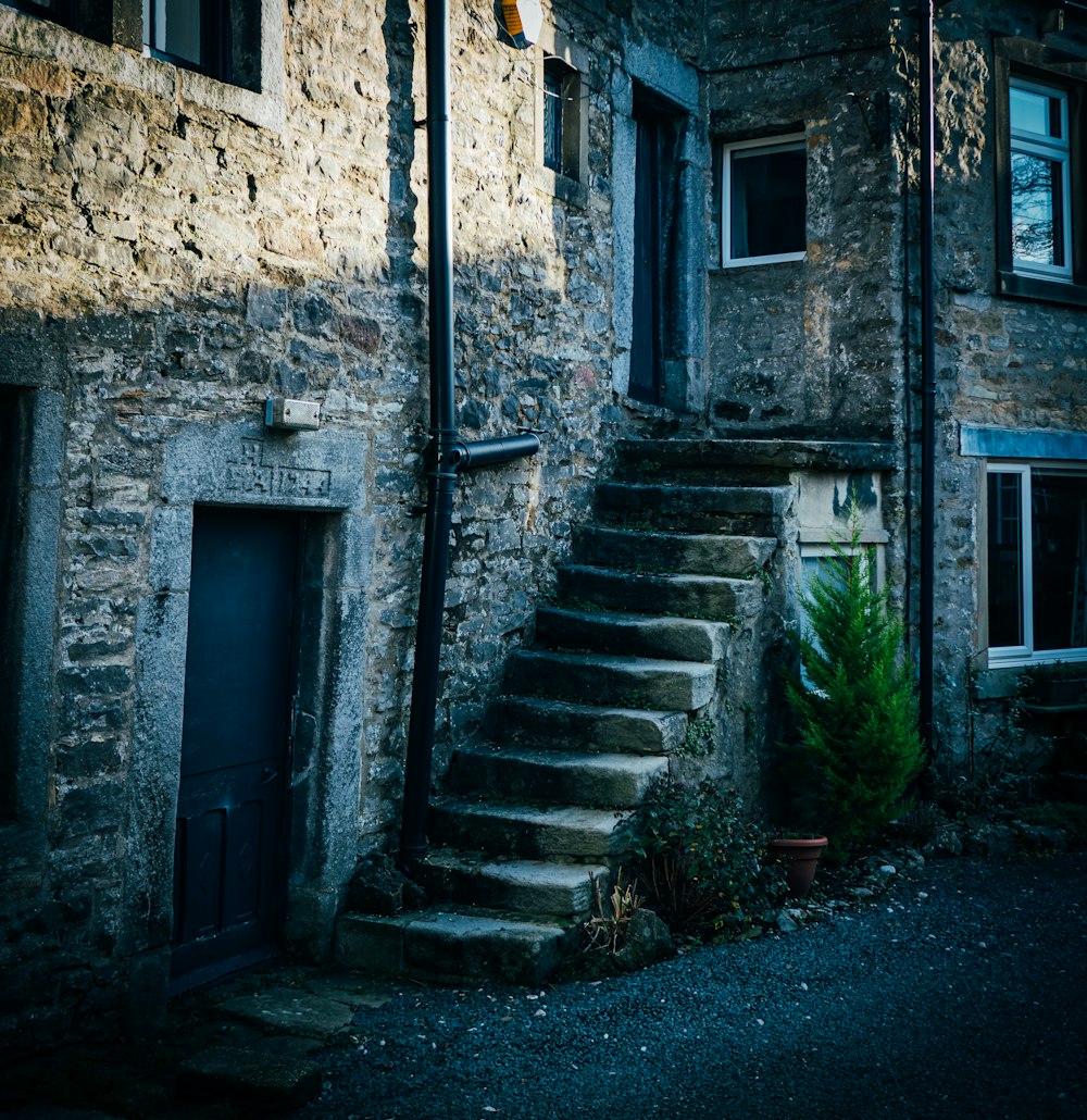 a stone building with a set of stairs leading up to it