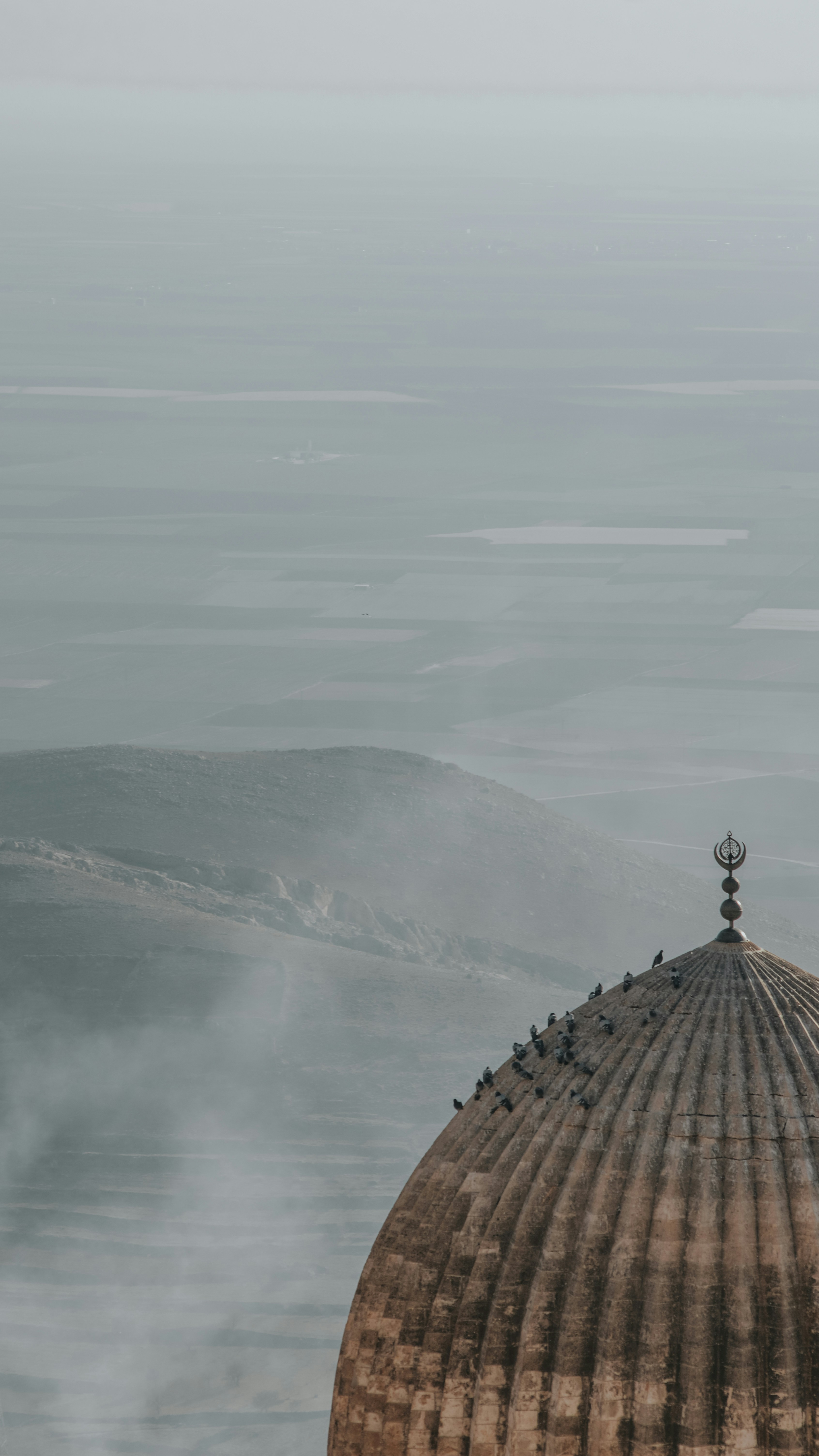 a large dome with a clock on top of it