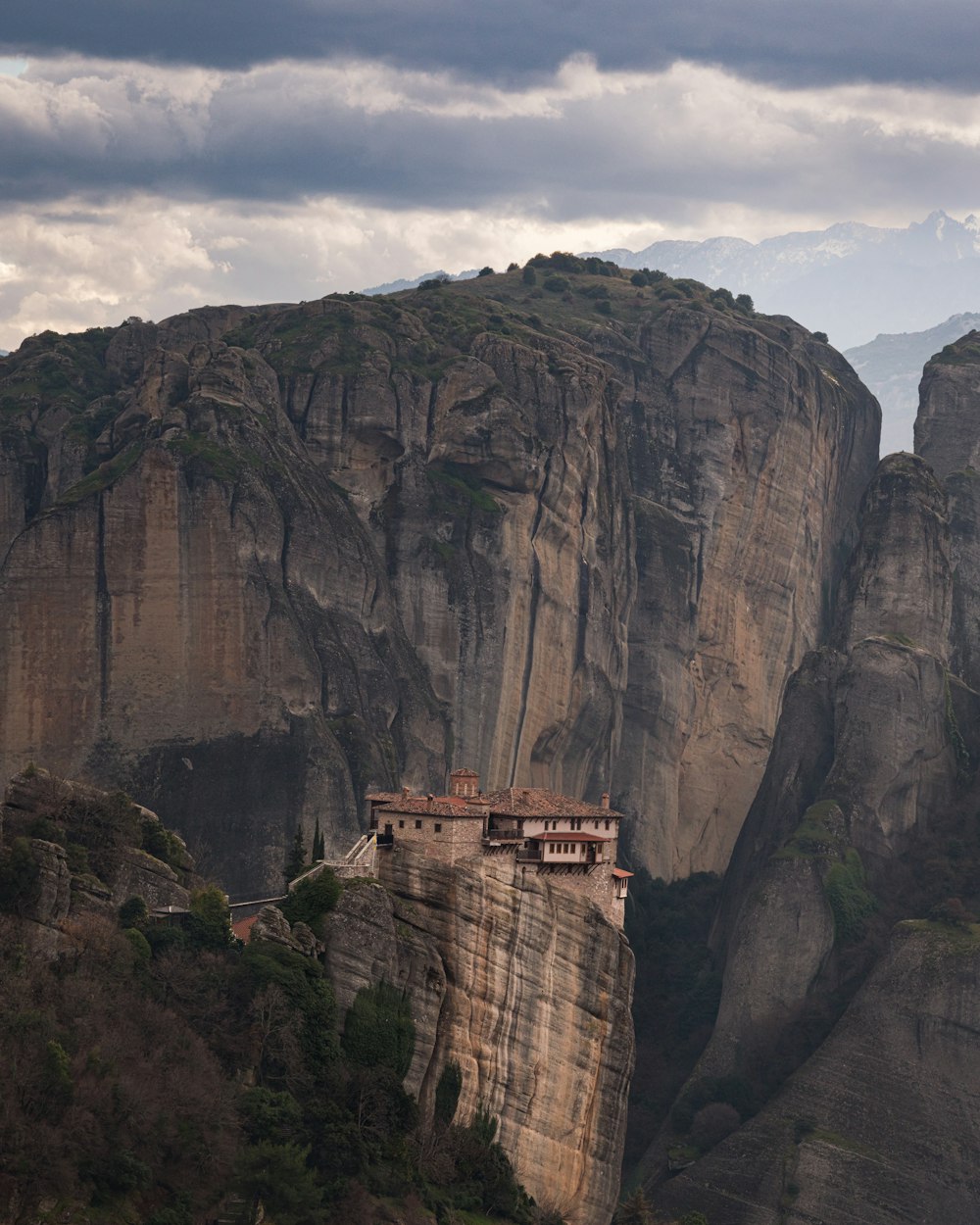 a mountain with a house on top of it