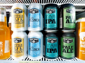 a refrigerator filled with lots of different types of beer