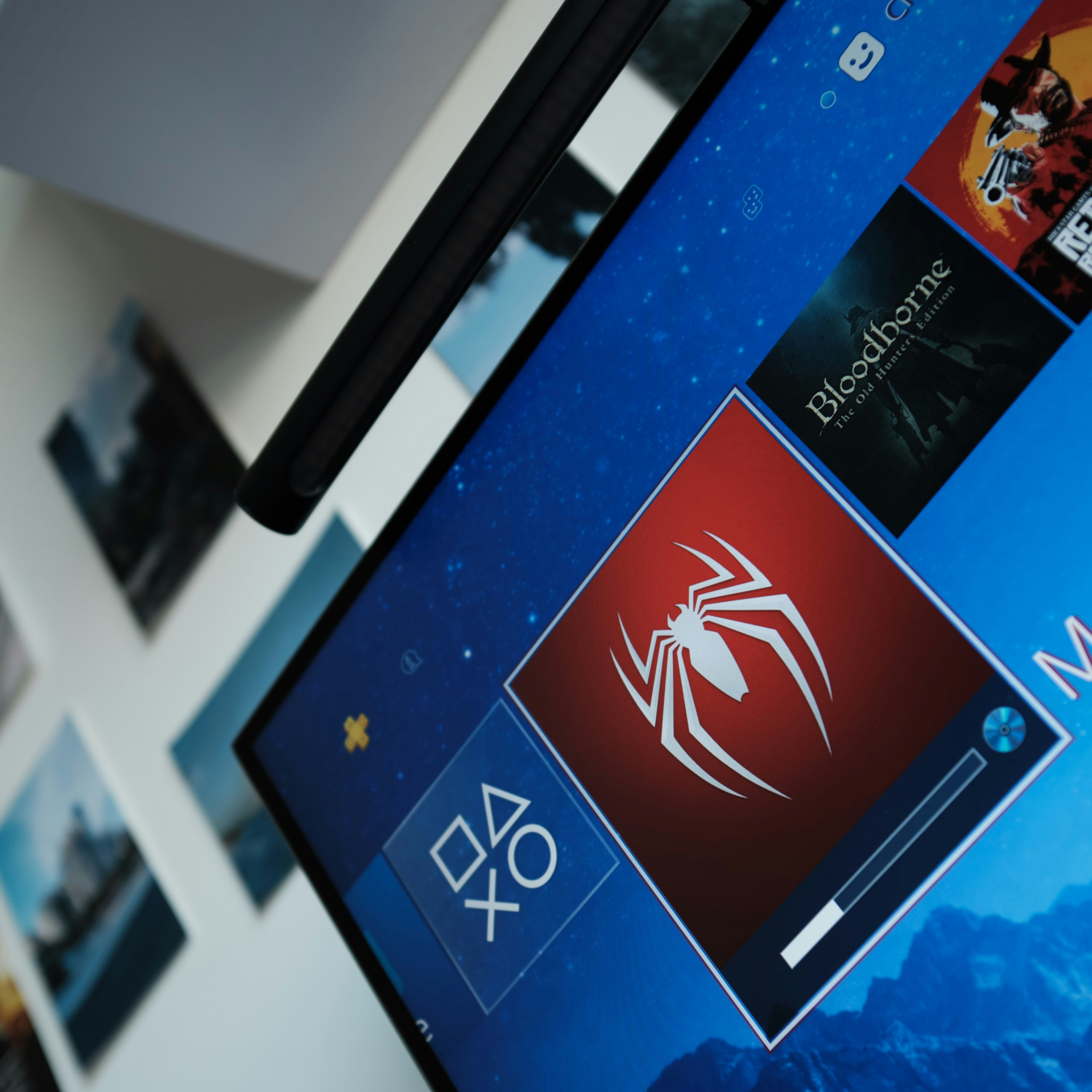a close up of a computer screen with a spiderman logo on it