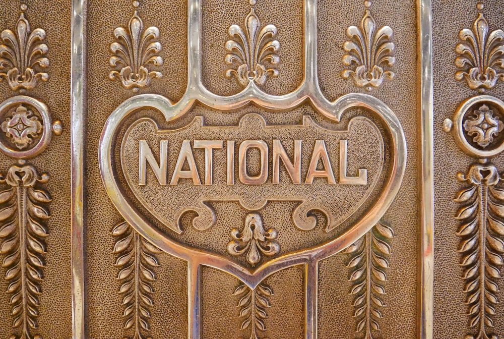 a close up of the national emblem on a door