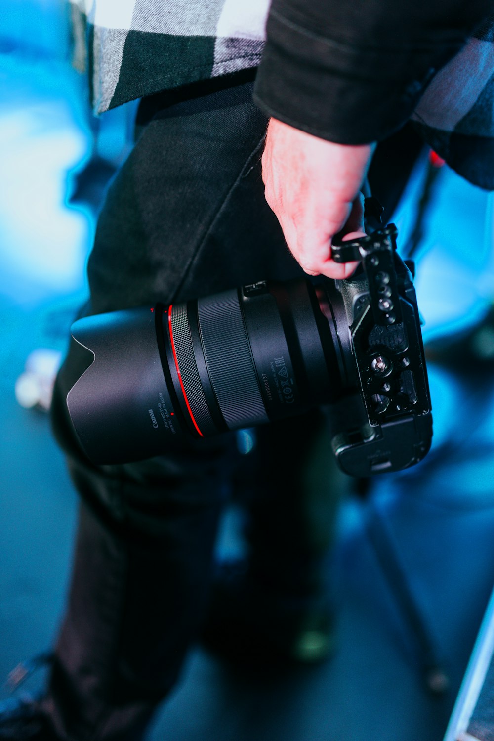 a person holding a camera in their hand