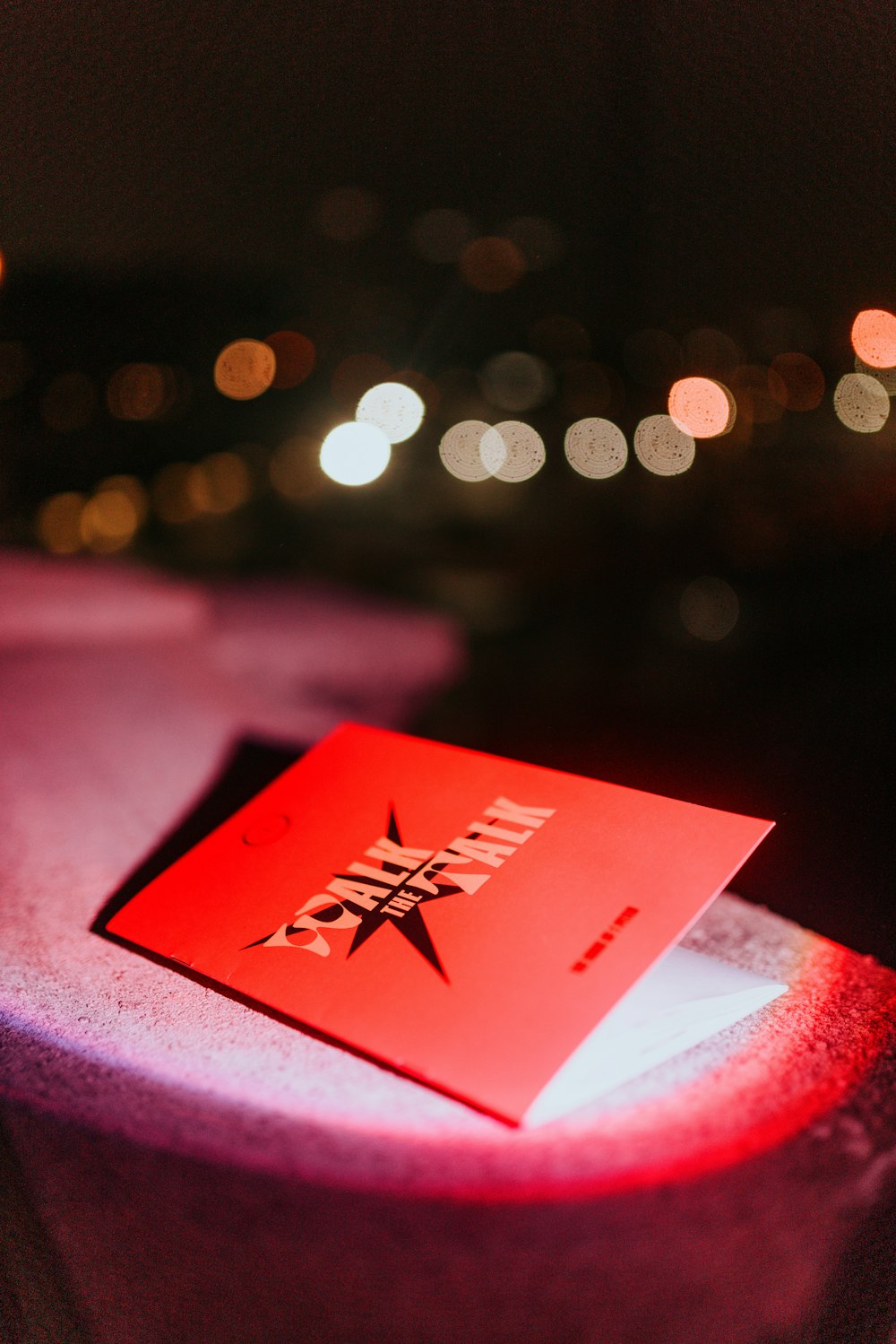 a red book sitting on top of a table