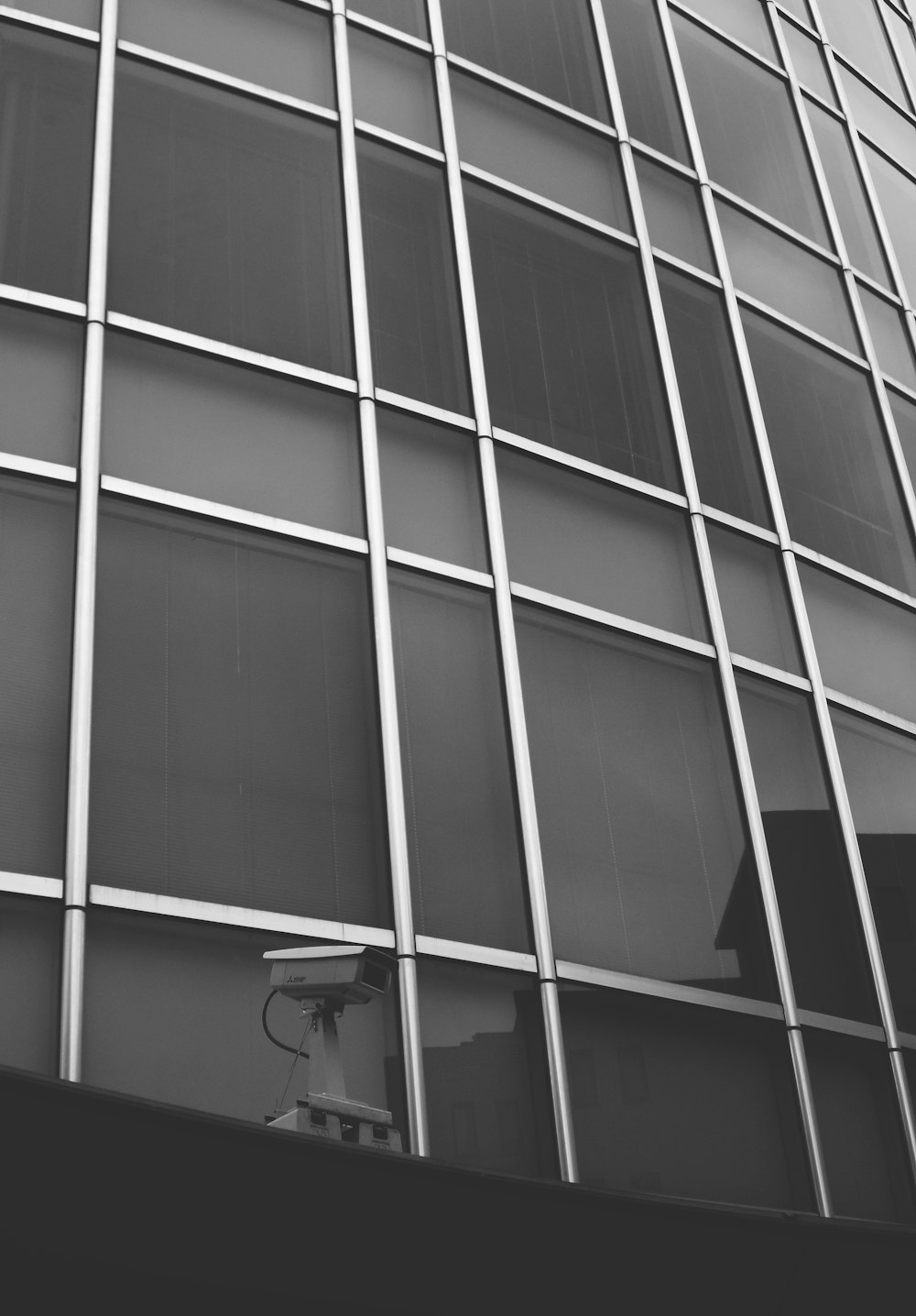 a black and white photo of a tall building