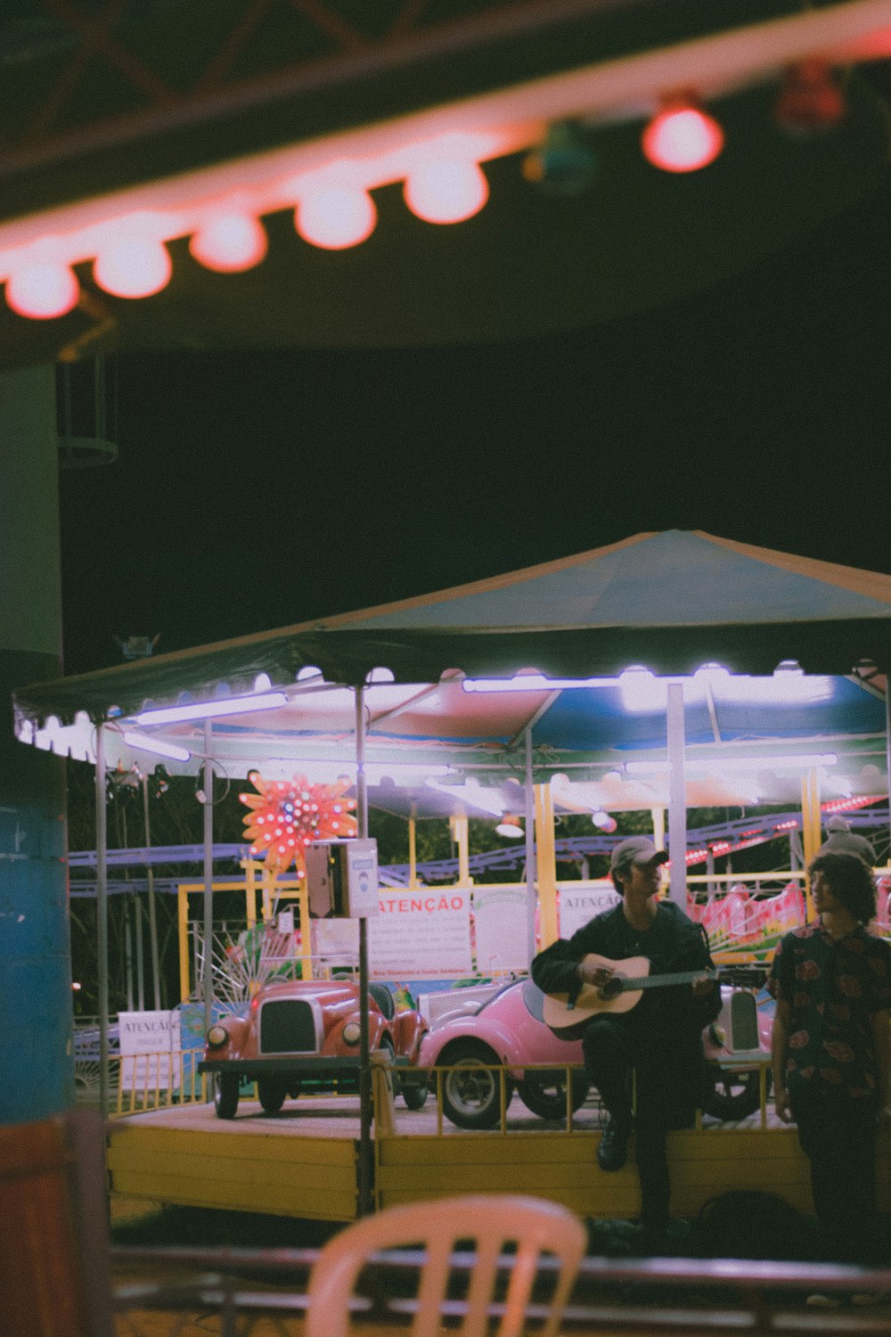 a couple of people that are playing guitar