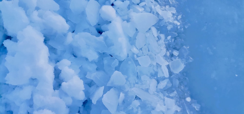 a close up of ice on the water