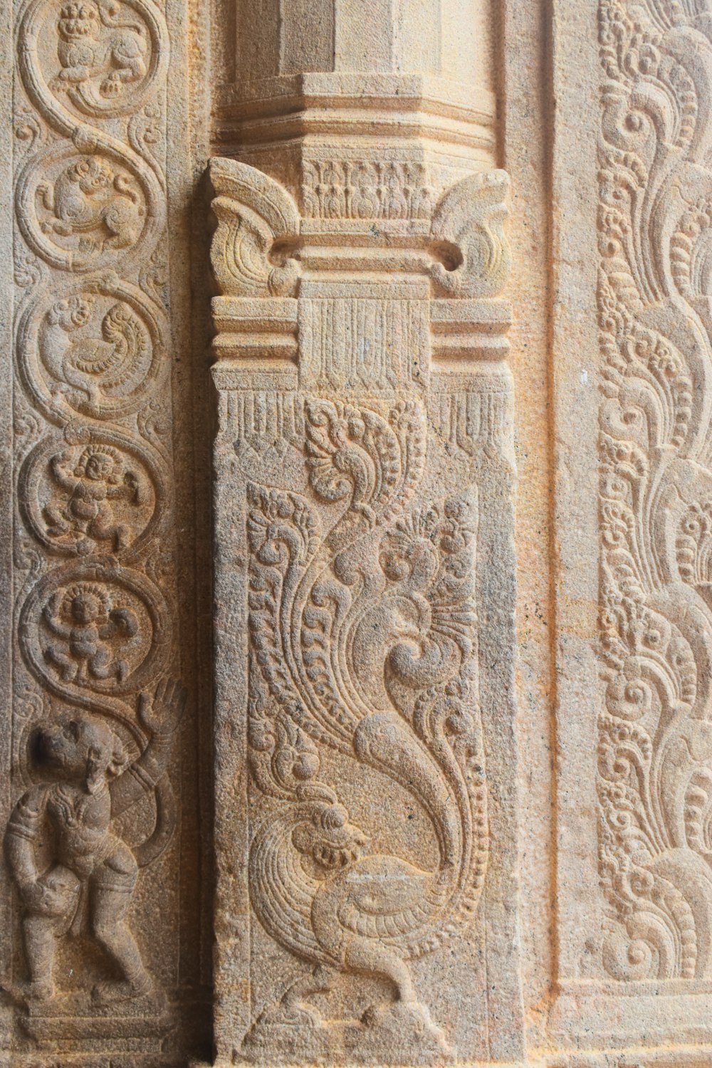 a close up of a carving on a wall