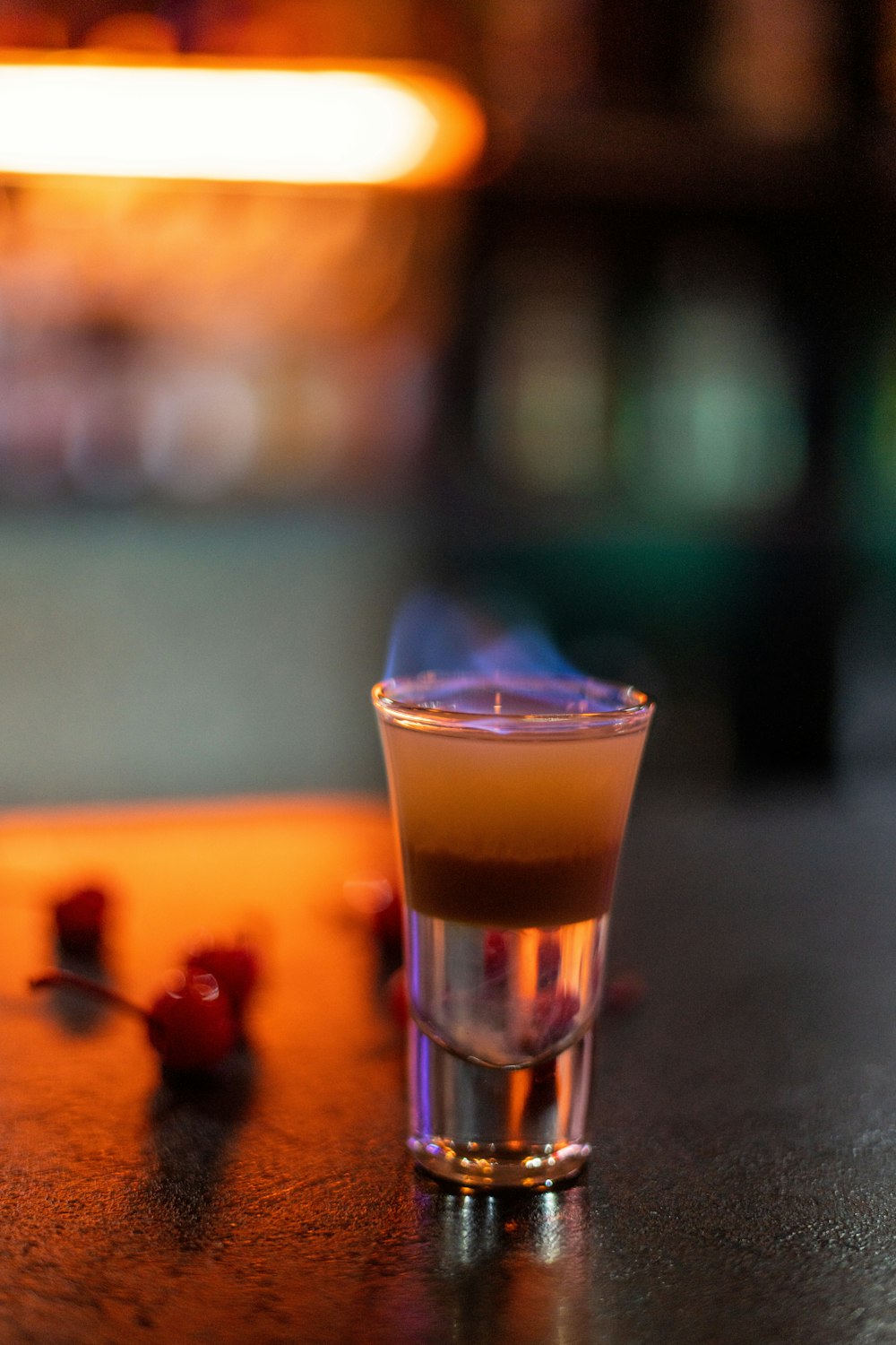 a shot glass sitting on top of a table