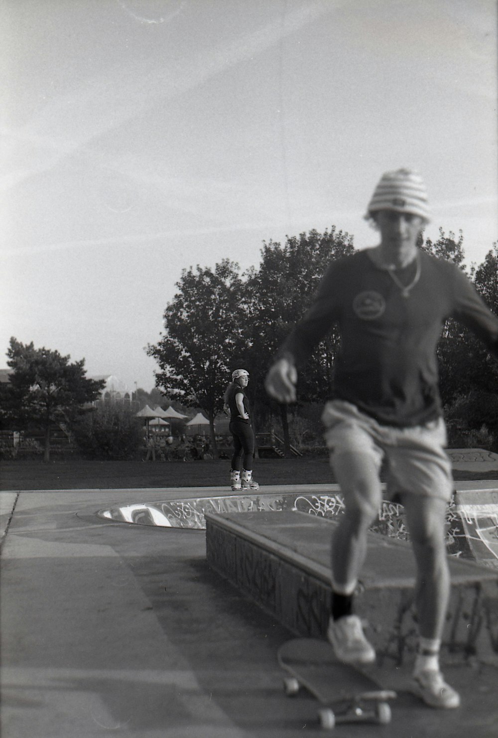 a man riding a skateboard on top of a ramp